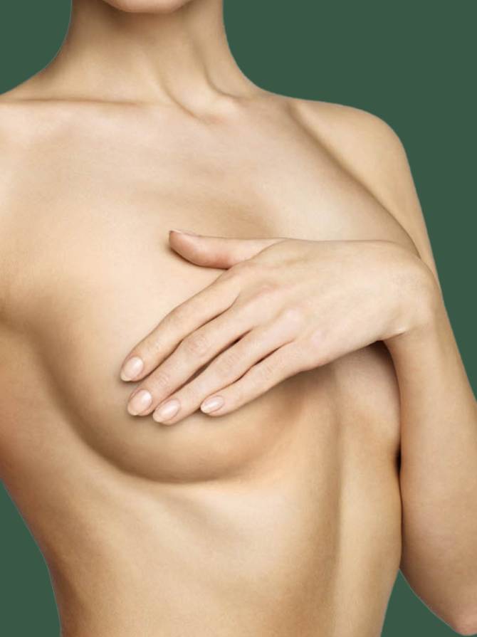 woman holding her breast